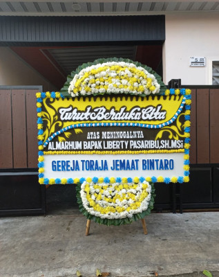 Papan Bunga Duka di Giritontro
